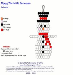 a cross stitch snowman ornament is shown in red, white and black