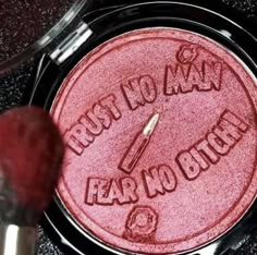 a close up of a frying pan with writing on it