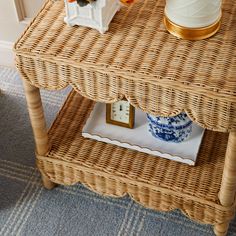 a wicker table with a clock on it