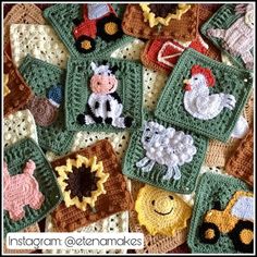 crocheted farm animals and farm animals are on the blanket