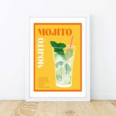 an orange and green mojito poster hangs on the wall next to a wooden floor