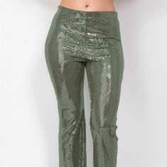 These Sequined Pants Add A Touch Of Glam To Your Formal Wear. The Mid-Rise Elastic Waistband And Flared Leg Create A Comfortable And Flattering Fit, While The Full Length Adds A Touch Of Sophistication. Key Features: - Fabric: 88% Polyester, 6% Metallic, 6% Spandex For A Comfortable Stretch And Glamorous Finish. - Fit: Mid-Rise With An Elastic Waistband And Flared Leg For A Flattering Silhouette. - Color Options: Available In Olive. - Sizes: Available In S, M, L. - Design: Features Dazzling Sequ Fitted Ankle-length Party Pants, Green Wide Leg Full Length Pants For Party, Green Sequined Party Bottoms, Green Bottoms For Night Out Party, Green Bottoms For Night Out, Green Sequined Bottoms For Spring, Spring Green Sequined Bottoms, Green Full-length Bottoms For Night Out, Green Sequined Bottoms For Night Out