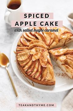 sliced apple cake with salted maple caramel on a white plate next to a cup of coffee