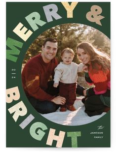 a merry and bright holiday card with an image of two people holding a baby in the middle