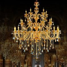 a large gold chandelier hanging from the ceiling