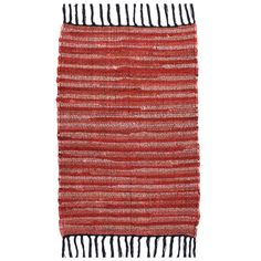 a red and black rug with fringes on the bottom, against a white background