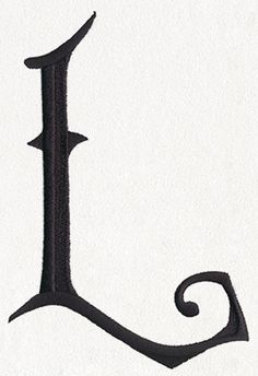 the letter l is made up of black thread and has an intricate design on it