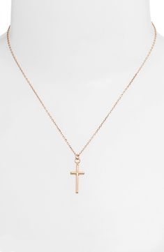 A simple cross pendant suspended from a slender chain is a delicate way to show commitment to your faith. Rhodium or goldtone plate Imported Cross Necklace Simple, Simple Cross, Indian Jewellery Design Earrings, Pearl And Diamond Ring, Indian Jewellery Design, Gold Cross Necklace, Gold Cross Pendant, Jewelry Design Earrings, Necklace Simple