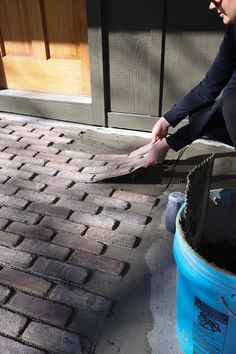 How To Install Bricks On A Concrete Porch Floor - Nadine Stay Porch Floor Ideas Concrete, Brick Tile Floor Outdoor, Brick House Screened Porch, How To Update Concrete Porch, Fixing Concrete Patio, Concrete Back Porch Ideas, Outdoor Tile Porch, Brick Over Concrete Porch, Brick Veneer Porch