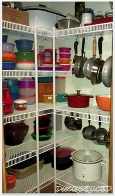 an organized pantry with pots and pans