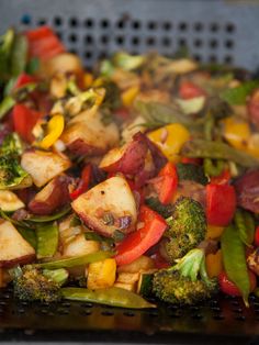 the vegetables are mixed together and ready to be cooked in the grilling pans