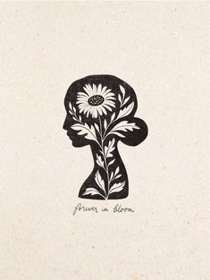 a black and white drawing of a person's head with sunflowers in it