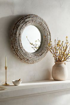 Finished with a ring of natural wood beads, this round mirror makes a natural statement in your home. | Beaded Round Wall Mirror in White at Terrain Beaded Mirror, Decorative Mirrors, Vintage Mirrors, Leaf Wall Art, Creative Living, Round Wall Mirror, Hand Poured Candle, Round Mirror, Round Wall