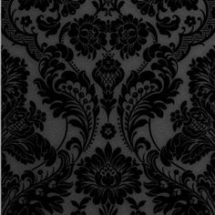 a black and white wallpaper with an ornate design on it's side,