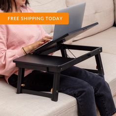 a woman sitting on a couch using a laptop computer with the text free shipping today