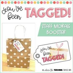 an advertisement for a gift bag with tags on it