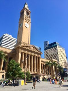 a tall clock tower towering over a city