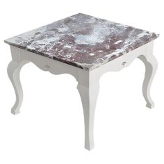 a small table with a marble top and white legs, on an isolated white background