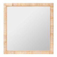 a bamboo frame mirror on a white background