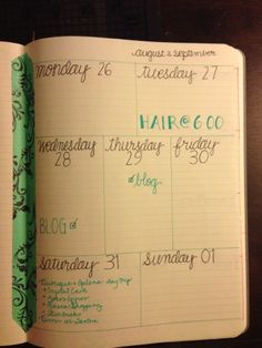 an open planner book with the date and time for each month in green writing on it