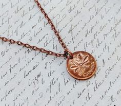 A personalized Canadian gift you can choose the year of penny you would like for your necklace, along with the chain length.  Reminder - the last year the Canadian penny was minted was in 2012! This item makes a great birthday gift and anniversary.  Wonderful for guests in Canada or expats missing home.   A thoughtful present and many people believe carrying a penny will bring them good luck. Your necklace will arrive in a small gift bag. Thanks for looking and contact me if you have any questio Canadian Penny, Penny Jewelry, Penny Necklace, Canadian Gifts, Missing Home, Small Gift Bags, A Penny, Bramble, Great Birthday Gifts