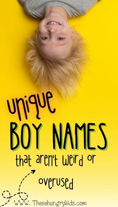 a young boy laying on his back with the words unique boy names that aren't weird or overused