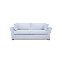 a white couch with pillows on it