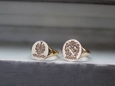 "gold signet ring delicately engraved with your family crest or any other initials or image you want ♡ the ring has solid back. deep and detailed engraving very delicately handcrafted unisex - looks super cool on both women & men side or inside engravings cost 12 USD for both sides. please contact us if you request side engravins or simply go back to our shop and purchase the \"Side or inside engraving fee\" listing. available in 4 oval face sizes: small - 11x13 mm medium - 13x15 mm large - Classic Engraved Signet Ring For Commemoration, Elegant Ceremonial Signet Ring With Engraving Option, Classic White Gold Signet Ring For Ceremonial Occasions, Classic Polished Signet Ring For Commemoration, Classic Hallmarked Signet Ring For Commemoration, Classic 14k Stamped Signet Ring For Commemoration, Engraved Oval Signet Ring For Commemoration, Elegant Gold Signet Ring For Commemoration, Heirloom Signet Ring For Commemoration