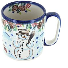 a blue and white coffee mug with a snowman on it