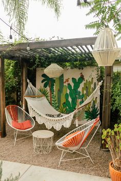 a white hammock sitting on top of a patio