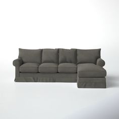 a gray couch and ottoman on a white background with no one in it or someone else