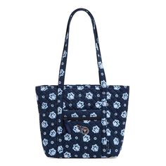 Explore the Vera Bradley NFL lineup of top-rated styles sure to capture your team spirit. We took everything you love about our timeless tote and reinterpreted it in this must-have handbag. Exterior features a front slip pocket, a zip pocket and a hidden top pocket Interior features six slip pockets Zip closure. Vera Bradley NFL Small Tote Bag Women in Tennessee Titans Bandana Backpack Lunch Bag, Small Tote Bag, Belt Purse, Tennessee Titans, Toiletry Bag Travel, Small Tote, Mini Purse, Stylish Bag, Paisley Print