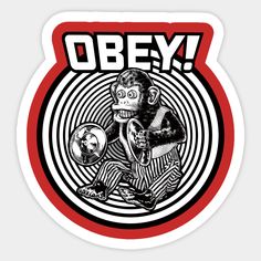 a sticker with an image of a monkey on it's face and the words obey