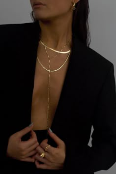 A lightweight showpiece, the Cressida 14K Gold-filled Y necklace, was designed to effortlessly move with you. The elongated flat bars reflect on the skin, creating a subtle yet lustrous glow. Crafted with a dramatic elongated drop, to perfectly accent v necklines or swimsuits, an alluring combination of necklace and body chain.Material: 14K Gold-filled Dimension: 16.5 to 19 inches adjustable, 12.5 inch drop, 2mm chain width What is 14K Gold-filled? A thick gold layer (100 times more gold than go Jewelry Capsule, Modern Gold Jewelry, Jewelry Wardrobe, Lana Jewelry, Y Necklace, Necklace Collection, Rose Quartz Stone, Jewelry Essentials, Demi Fine Jewelry