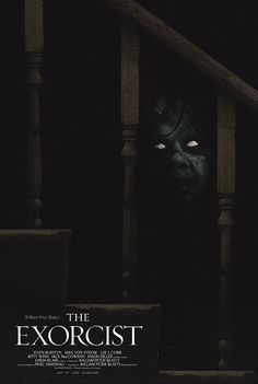 the exorcist movie poster with an evil looking face in the dark room