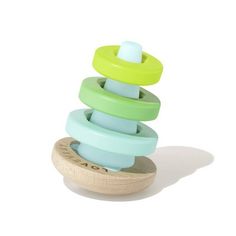 a stack of colorful wooden toys sitting on top of each other