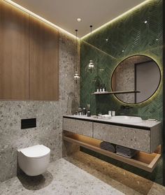 a bathroom with a toilet, sink and large mirror in it's center wall