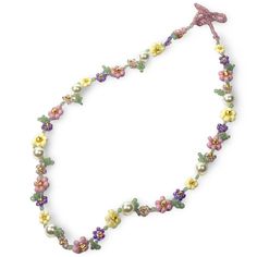 a necklace with flowers and pearls on it