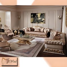 a living room filled with lots of furniture next to a wall mounted painting on the wall