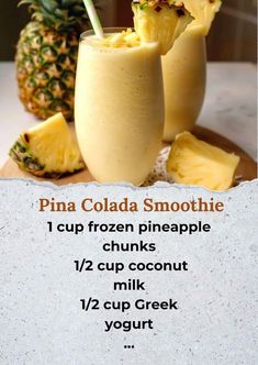 a pineapple smoothie is served in two glasses