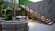 a living room filled with lots of furniture next to a stair case covered in plants