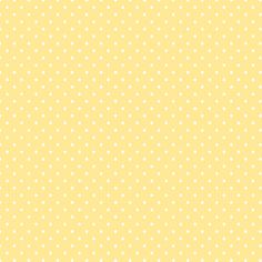 a yellow background with white polka dots