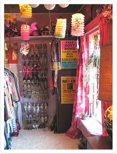 a room filled with lots of different types of items and lights hanging from the ceiling