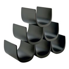 there are five black shelves stacked on top of each other in the shape of circles