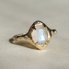 a close up of a ring with a stone