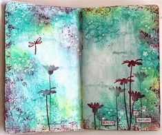 an altered book with flowers and dragonflies on it's pages, opened to show the inside page