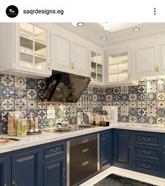 a kitchen with blue cabinets and white counter tops is featured in the magazine saarddesigns