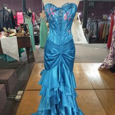 Two Piece Overlay, Corset Like Top Lace Up Front And Back, Mermaid Cut Skirt With Layered Ruffles Iridescent Blue Dress, Turquoise Prom Couple, Under The Sea Prom Dress, Mermaid Theme Dress, Ocean Themed Dress, Mermaid Birthday Dress, 2000s Dresses, Jellyfish Dress, Lilac Prom Dress