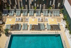 an aerial view of the pool and lounge chairs