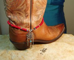 "Red 5mm Rondelles, 5mm Blue Turquoise, 925 Silver Turquoise Inlay Feathers Silver Lobster Clasp 14 1/2\" Boot Bracelet Handmade by me, \"Limpin' Lizard\". FREE SHIPPING. When ordering please let me know what size Boot you wear. Boot in the picture is a handmade 7 1/2 womens, which requires the 14 1/2\" Bracelet, smaller-a little shorter, & larger, a little longer. I will fit the Bracelet to match your Boot Size. FREE SHIPPING in the USA, $11 Everywhere else, It costs me $14.83 to ship to ot Western Style Red Jewelry As Gift, Cowgirl Boot Jewelry, Boot Jewelry Bling, Cowboy Boot Jewelry, Western Boot Bracelet, Pearl Boots, Cowboy Accessories, Cowgirl Boots Wedding, Rodeo Jewelry